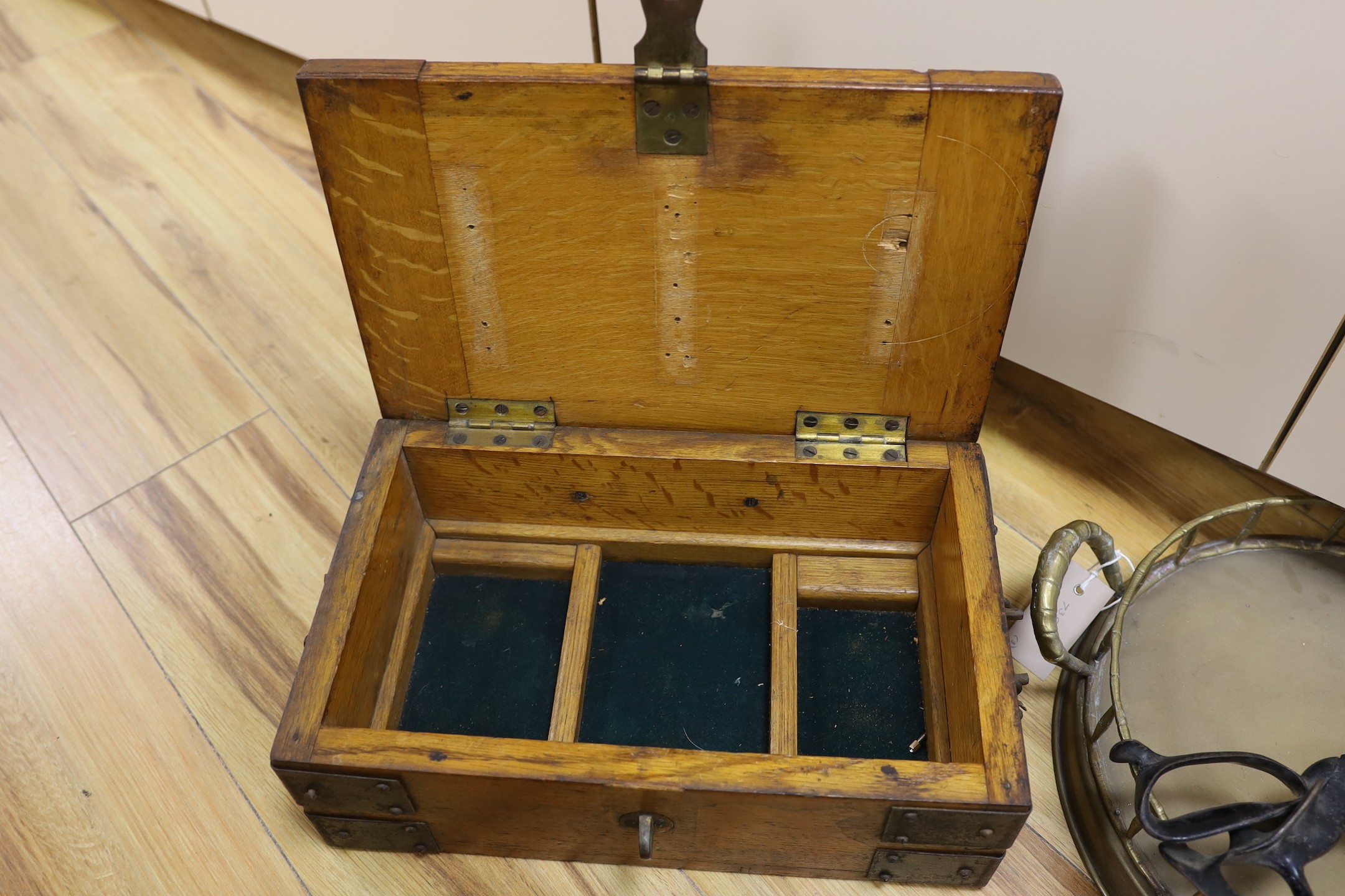 An oak and metal bound box, a circular brass tray and a pair of draper's scissors